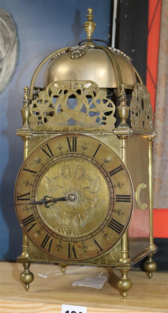 A lantern clock with later movement height 39cm